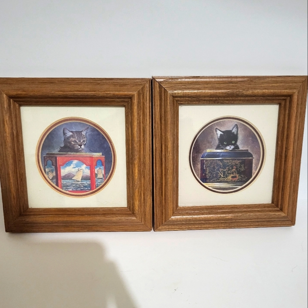 2 small cat art prints in frames by artist Arnie Fisk